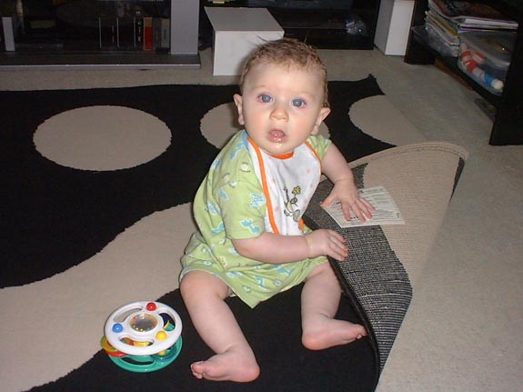 [Tom caught in the act of hiding things under the carpet!]