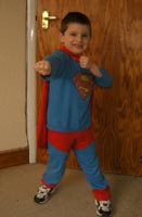 Dressing up: Look! Up in the sky! Is it a bird? Is it a plane? No! It's Super-Tom!