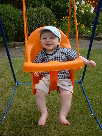 [Playing on his swing]