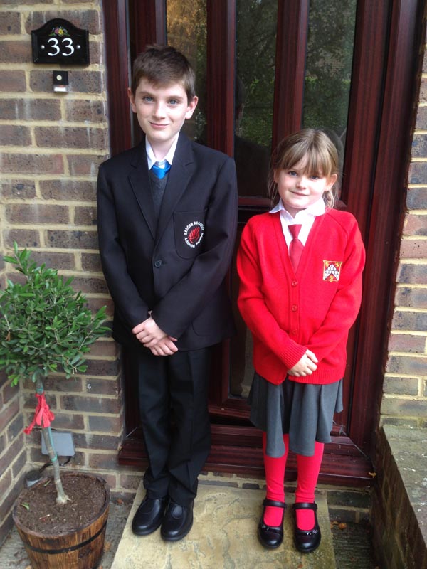 [Tom & Emma's new school uniforms]