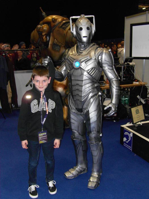 [Tom caught by a Cyberman]