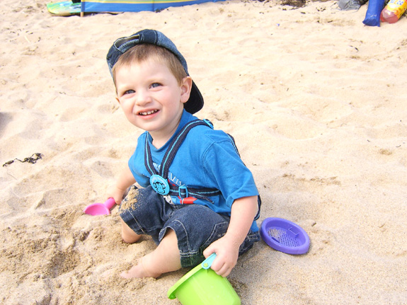 [Happy as a sand boy!]
